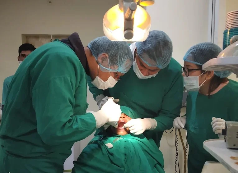 Dental surgery team performing a procedure