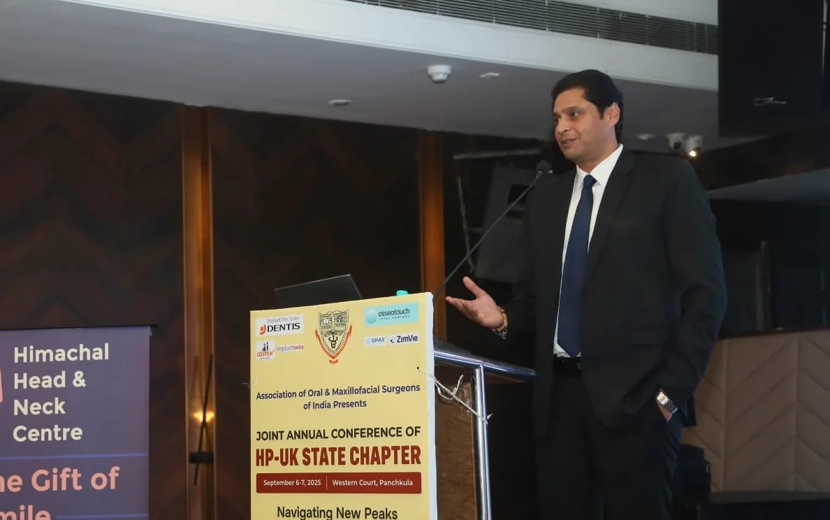 Dr. Rahul Sharma speaking at a dental conference